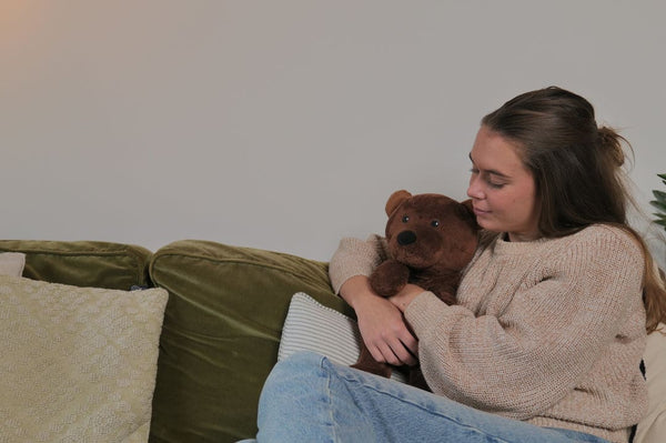 Banner weighted cuddly toy fellow sufferer bear and dog